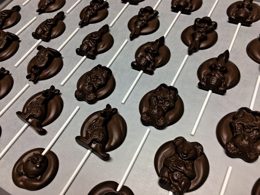 Sucettes choc. lait - Vrac
